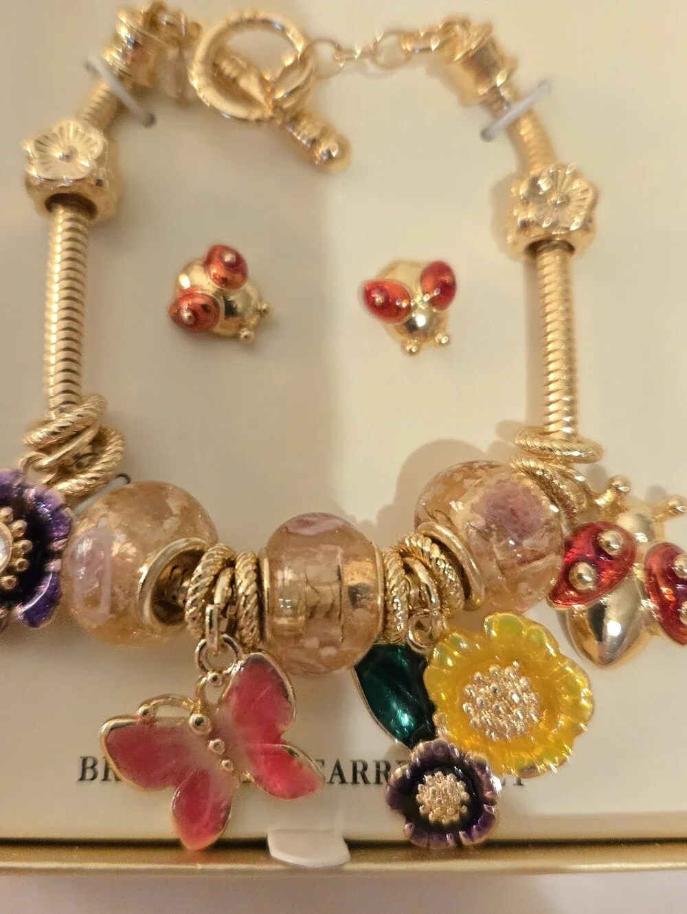 Napier New Gold Tone Charm Bracelet & Stud Earring Set Floral Lady Bug Butterfly
